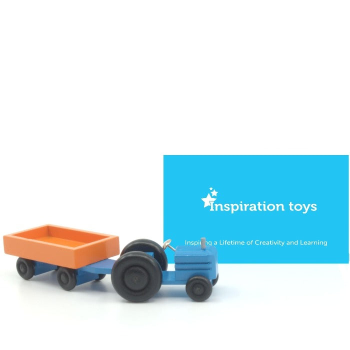 Wooden toy tractor blue and orange trailer connected..