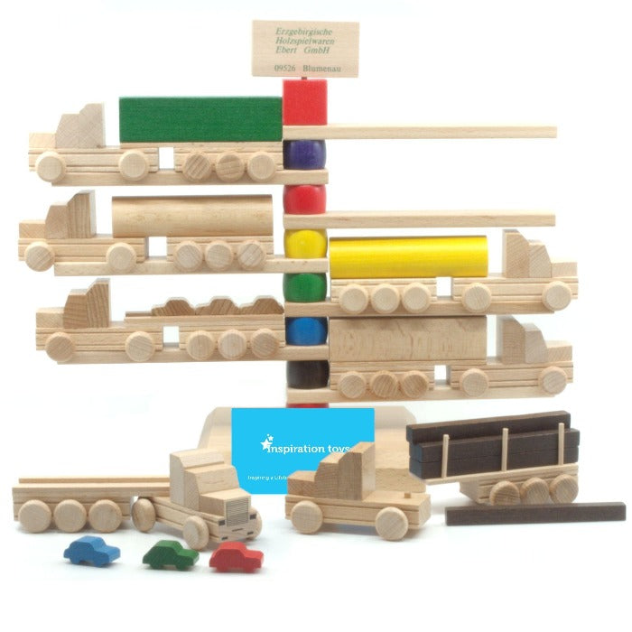 Wooden Toy truck collection on stand.