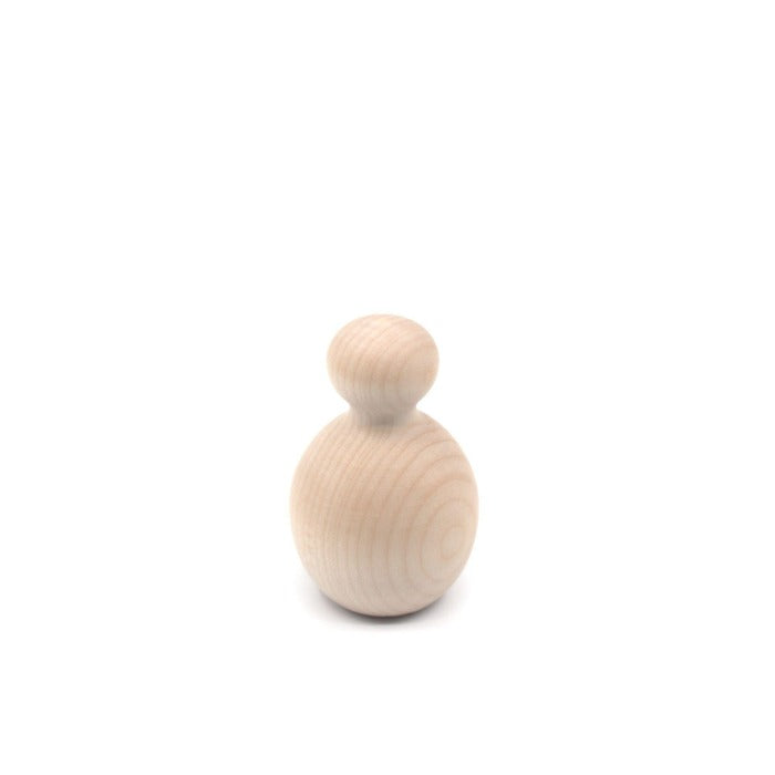 Natural wooden baby rattle rounded standing up.